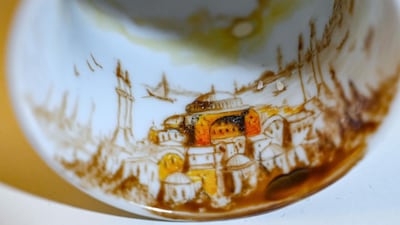 A painted Turkish coffee cup by Turkey's micro artist Hasan Kale in Istanbul.