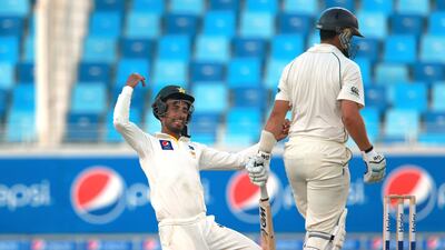 Shan Masood of Pakistan celebrates catching out New Zealand batsman Ross Taylor off the bowling of Yasir Shar during Day 1 of the second Test in Dubai on November 17, 2014. Getty