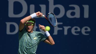 Denis Istomin of Uzbekistan works hard against Marton Fucsovics. Tom Dulat / Getty Images