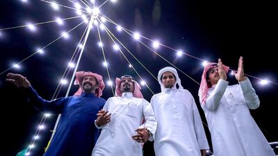 Abu Dhabi, United Arab Emirates, December 10, 2019. --Saudi Arabians celebrate the victory of a one-year-old camel at the Dawasir tribe camp in Al Dhafra, Abu Dhabi, UAE. Victor Besa / The National Section: NA Reporter: Anna Zacharias