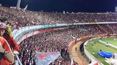 Internacional fans celebrate their side’s 3-0 Copa Libertadores victory against Bolivian side Club Jorge Wilstermann on March 30. Many in Brazil expect the planned refurbishment of the country’s stadia to go down to the wire before the tournament starts in June 2014.