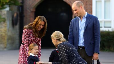 Helen Haslem, head of the lower school, greets Princess Charlotte as she arrives for her first day of school with the Duke and Duchess of Cambridge, at Thomas's Battersea on September 5, 2019 in London, England. Getty Images