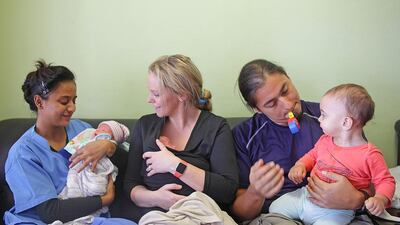 Rami and Renée Hassan who both live in Abu Dhabi have hired three nannies to attend to the new born twins, Suvi and Zara. First child Theo (in orange) was born via surrogacy last year in Anand, and twins, Suvi and Zara, were born last month to a surrogate at Dr Nayana Patel’s clinic in Anand. Subhash Sharma for The National