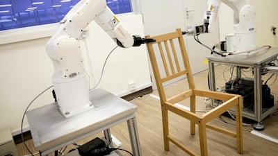No more sore thumbs - robots put together an Ikea chair at Nanyang Technological University (NTU) in Singapore. Reuters
