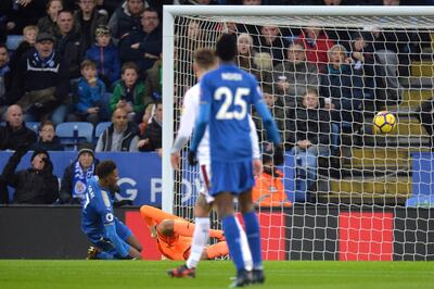Demarai Gray slides in to score Leicester City's goal. Peter Powell / Reuters