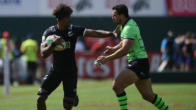 Masirewa and Jamie Farndale of Scotland battle for the ball. Getty Images