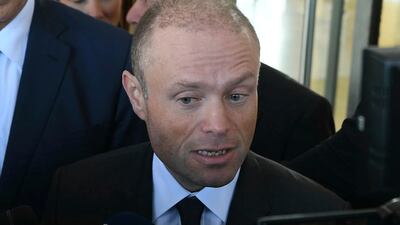 Malta's Prime Minister Joseph Muscat talks to reporters in Valletta, Malta, Wednesday, November 20, 2019. AP Photo/Jonathan Borg