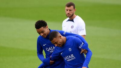 Kylian Mbappe with Hugo Ekitike during training. AFP