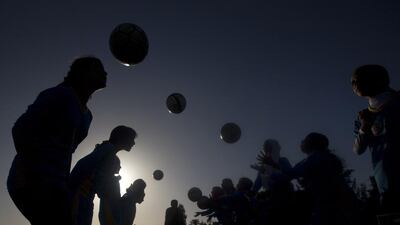 Palestinian girls tarining at the Beit Lahia football club in the northern Gaza strip as part of an after-school sport program funded by the Palestine Association for Children’s Encouragement of Sports. Mahmud Hams / AFP