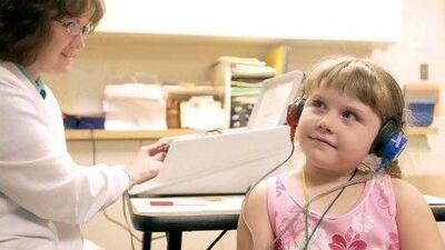 Katie Manes undergoes a hearing test with Brenda Engelman, a nurse and audiologist, in Pittsburg. A report in the US found that audiologists, who assess and treat hearing disorders, have one of the least stressful jobs.