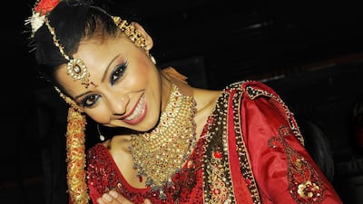 Carol Furtado, lead dancer, The Merchants of Bollywood, in full costume poses for the camera before going on stage.