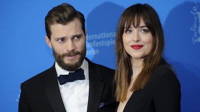 Jamie Dornan and Dakota Johnson, who starred in Fifty Shades of Grey. Mr Dornan is the son of the late Prof Jim Dornan. Stefanie Loos / Reuters