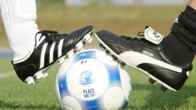 Employees of Adidas and Puma have played a friendly football match.