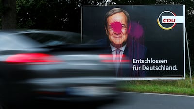 Paint is splattered on a potser of the CDU's Armin Laschet in Cologne. Photo: Reuters