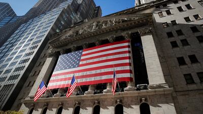 The US flag covers the facade of the New York Stock Exchange. The S&P 500 Index closed at two-month high on Monday. Reuters