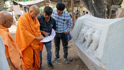 The pillars carved in Indian villages are numbered as per a unique identification system and matched with a corresponding code when set in place at the temple site. Photo: Baps Hindu Mandir