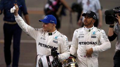 Valtteri Bottas, left, has won once in four races that he has started at the front of the grid. On Sunday in Abu Dhabi, he has another chance. Hassan Ammar / AP Photo