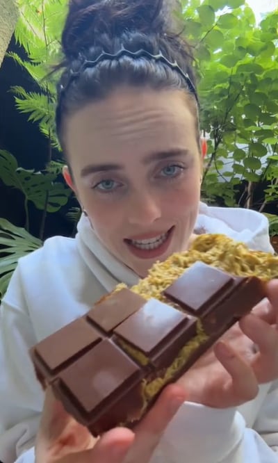 Eilish is then seen devouring her own creation. Billie Eilish / TikTok