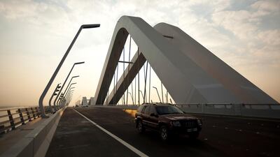 Sheikh Zayed Bridge was designed by renowned Iraqi architect Zaha Hadid. It was opened in 2010, becoming the third gateway from Abu Dhabi island to the greater emirate. During the Year of Zayed in 2019, a special Dh100 note, which is still in circulation, was printed depicting the bridge. Andrew Henderson / The National