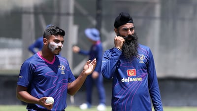 UAE's Aayan Khan with new left-arm spinner Simranjeet Singh, right, as the national team trains for their tour of Netherlands at the ICC Academy in Dubai. All Photos: Chris Whiteoak / The National