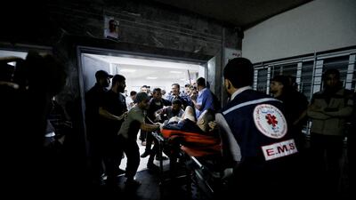 A wounded person is attended to at Al Shifa hospital in Gaza city. The medical centre has been struck several times by Israeli forces. Reuters