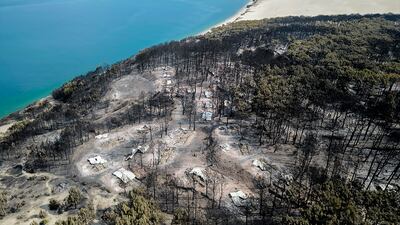 An aerial view of the Pyla dune in Pyla sur Mer, near Arcachon, south-west France. In the Gironde region of France, two huge fires feeding on tinder-dry pine forests forced tens of thousands of people to flee homes and summer vacation spots since they broke out July 12. AP