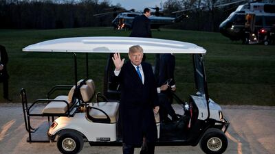 US President Donald Trump waves after stepping out of a golf cart following a dinner with French President Emmanuel Macron (not pictured) at the Mount Vernon estate of first US President George Washington in Mount Vernon, Virginia, USA, on April 23, 2018. President Macron will be in Washington DC for three days for a state visit at the White House and an address to a joint session of Congress on 25 April. Andrew Harrer / EPA