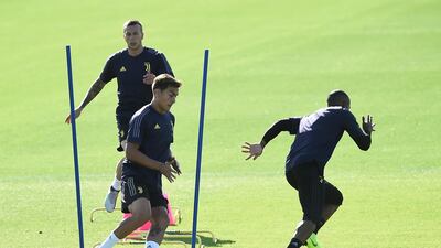 Federico Bernardeschi and Paulo Dybala during training. Reuters