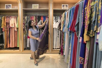 Jenny Aceveda, works at Beenas shop in Al Muhairy Centre in Al Hosn. Reem Mohammed / The National