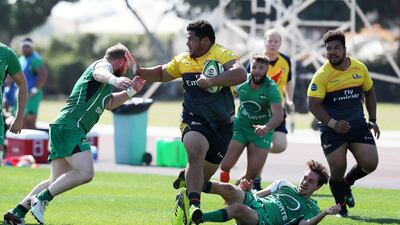 Dubai Hurricanes, in black and yellow, defeated Dubai Sports City Eagles in the West Asia Premiership. Pawan Singh / The National