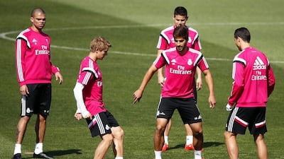 Martin Odegaard in training on Tuesday with Real Madrid teammates James Rodriguez, back, Pepe, back left, Cristiano Ronaldo, right and Lucas Silva. Javier Lizon / EPA / April 28, 2015