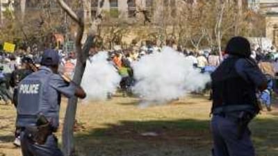 South African police fire tear gas and rubber bullets at protesting soldiers in Pretoria late last month.