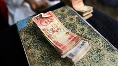 The rupee has lost about a third of its value against the US dollar in the past two years. Dhiraj Singh / Bloomberg News