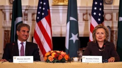 The US secretary of state, Hillary Clinton, and Pakistan's foreign minister, Shah Mahmood Qureshi, speak during the US-Pakistan strategic dialogue plenary session at the State Department in Washington yesterday.
