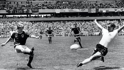 Scotland's Gordon Strachan, left, scores his team's first goal during the World Cup match against West Germany in Queretaro, Mexico on June 8, 1986. Kienzle / AP Photo
