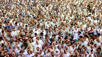 Shiite pilgrims pounding their hands during a major religious festival at the Imam Abbas shrine in Karbala, 50 miles (80 kilometers) south of Baghdad, Iraq, Thursday, July 5, 2012. The Shabaniyah festival marks the birth of Mohammed al-Mahdi, the 12th Shiite imam who disappeared in the 9th century. (AP Photo/Hadi Mizban)
