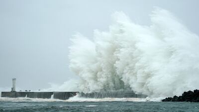 Surging waves generated by Typhoon Hagibis hit against a breakwater at a port in the town of Kiho, Mie Prefecture, Japan. EPA