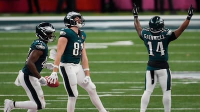 Philadelphia Eagles tight end Grant Calcaterra (81), running back Kenneth Gainwell (14) and Philadelphia Eagles linebacker Oren Burks (42) celebrate. AP