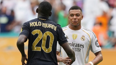 Real Madrid's Kylian Mbappe and Juventus' Randal Kolo Muani shake hands after the match. AP