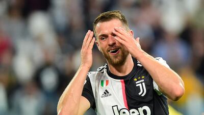 Juventus' Aaron Ramsey reacts to a missed chance. AFP