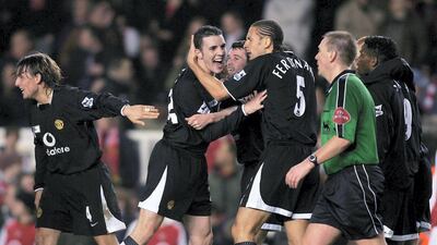 John O'Shea of Manchester United celebrates the fourth goal in a 4-2 win against Arsenal in 2004. The game begun with a heated exchange between Patrick Vieira and Roy Keane in the tunnel prior to kick off. Getty Images