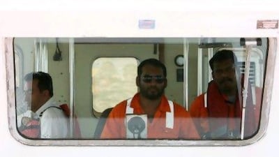 Crew members of a pilot boat in Jebel Ali port. Pawan Singh / The National