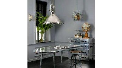 If space is tight, you'll have to be creative with furniture. The Space Wing Desk would look great adjacent to the kitchen and can double as a dining table. Keep a set of drawers close so you can file away paperwork at the end of the workday. Courtesy of Eichholtz