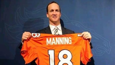 Peyton Manning signed up for Denver Broncosduring a news conference last week.