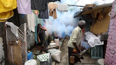 Slums in India are sprayed to prevent mosquitoes spreading disease. Health chiefs warn a hotter planet could have severe health effects such as increased illness. EPA