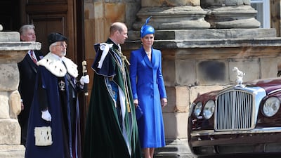The Prince and Princess of Wales leaving the palace. PA