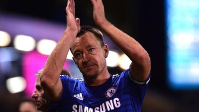 Chelsea's John Terry applauds supporters after their win over Burnley on Monday night. Paul Ellis / AFP / August 18, 2014