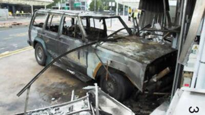 The burnt out wreckage of a Jeep Cherokee, which was used in a terrorist attack on Glasgow Airport, Scotland.