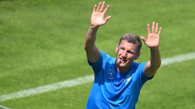 Bastian Schweinsteiger greets fans during a training session on Tuesday as he prepares to play Friday in a friendly against Armenia. Andreas Gebert / EPA / June 3, 2014