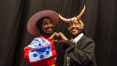 Two women cosplay as Monkey D Luffy and Loki
